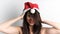 Woman wearing santa claus hat