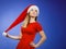 Woman wearing Santa Claus helper costume