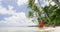 Woman Wearing Sarong Walking On Beach On Summer Vacation in Tropical Paradise