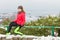 Woman wearing warm sportswear relaxing after exercising