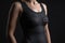 Woman Wears Black Bodysuit. Generative AI