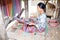 Woman is weaving , Sade village, Lombok