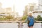 Woman westerner admiring the view of city in morning, Travelling