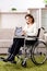 The woman in wheelchair at home