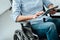 Woman in wheelchair using a tablet