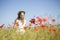 Woman at white dress found beatiful flower