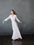 Woman in white dress movement dance glamor