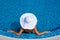 Woman with white hat in swimming pool