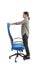 Woman who adjusts his ergonomic chair in the office