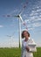 Woman with Wind Turbine and Laptop