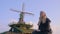 Woman By Windmill