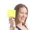 Woman winking and showing a blank yellow paper note