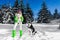Woman winter portrait with Husky dog. Winter fashion model with winter outfit and ski goggles. Attractive young woman in