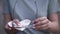 Woman wiping glasses with a napkin