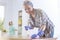 Woman wiping a table