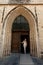 Woman wooden door Gothic Church