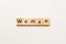 woman word written on wood block. woman text on table, concept