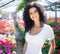 Woman at work in a greenhouse