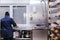 Woman working on bakery preparing sweets