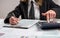 woman working with business report document , filling tax form, accounting