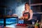 Woman is working with cakes at bakery shop