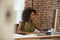 Woman Working At Computer In Contemporary Office