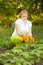 Woman working in field of beans