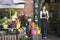 Woman working at flower shop smiling