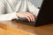 Woman working on a laptop at her workplace