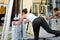 Woman working out her legs with pulley.