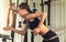 Woman working out with Resistance elastic in gym