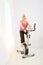 Woman working out on spinning bike