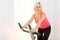 Woman working out on spinning bike