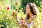 Woman working in roses plants