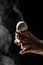 Woman working in a small family creamery is processing the final steps of making a cheese, produces handmade mozzarella, silano or