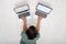 Woman Working On Two Laptops