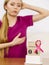 Woman and world breast cancer day on calendar