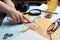 Woman with world map at table. Travel during summer vacation