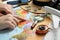 Woman with world map at table. Travel during summer vacation