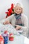 Woman Wrapping Christmas Present