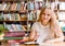 Woman writes notes in the library