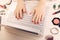 Woman writing fashion blog. laptop and accessories on the table