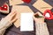 Woman writing love letter or romantic poem for Valentines day, top view of female hands. Valentine day concept with copyspace