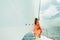 Woman yachting white sails luxury sailboat travel