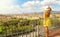 Woman in yellow dress looks at stunning panoramic view of Florence, Italy. Full length of happy cheerful pretty girl in Tuscany