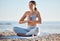 Woman, yoga and beach for fitness, health and wellness with a mindfulness exercise in nature environment. Sea, pilates