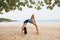 woman yoga gymnastics beach young practice lifestyle sport exercise bridge training