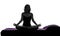 Woman yoga sitting lotus posture in bed silhouette