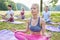 Woman in yoga workshop meditating