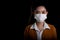 Woman of young Asia woman putting on a face mask to protect from airborne respiratory diseases as the flu covid-19 coronavirus PM2